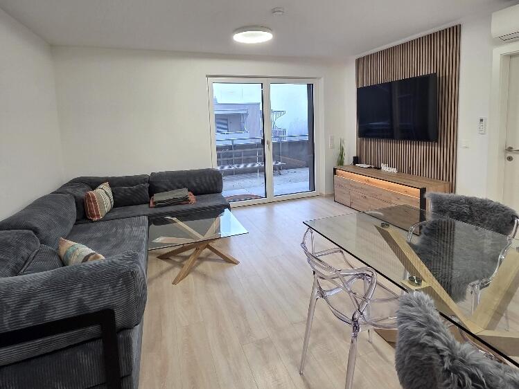 Geräumiger Wohnbereich mit Schlafsofa – Ferienwohnung Klopeiner See